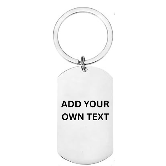 Reverse of personalised Cornwall stainless steel dog tag keyring showing laser engraved text personalisation area on white background