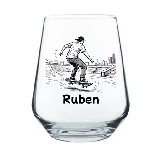 Personalised skateboarding stemless beer glass custom printed
with dynamic skateboarder on ramp illustration and personalised
name below on white background