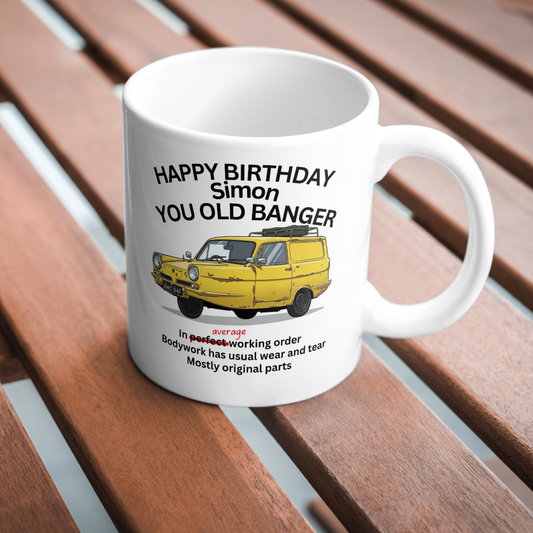 You Old Banger personalised funny birthday mug showing ink
printed design from left side angle on black background