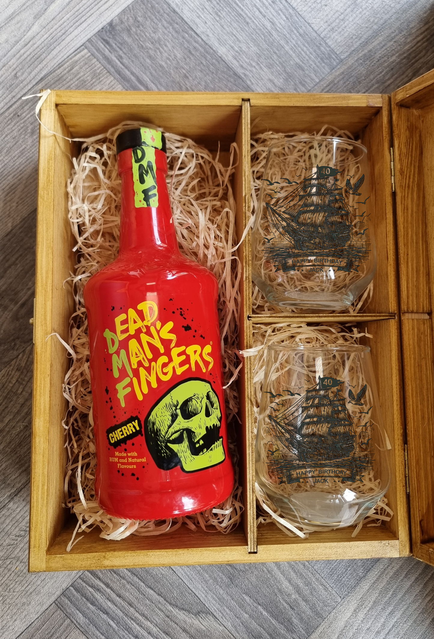 Inside view of personalised rum glass gift box showing glass and coaster nestled in protective packaging