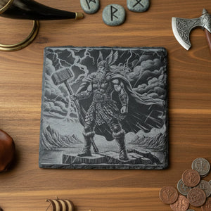Personalised slate or bamboo coaster engraved with a detailed illustration of Thor, the Norse god of thunder, featuring his iconic hammer Mjölnir and powerful stance, natural wood or stone texture, ideal for mythology fans or as a bold, themed gift.