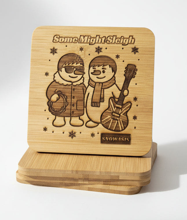 Funny Oasis-inspired bamboo coaster with two snowmen, engraved text “Some Might Sleigh” and “Snowasis” – Christmas music fan gift