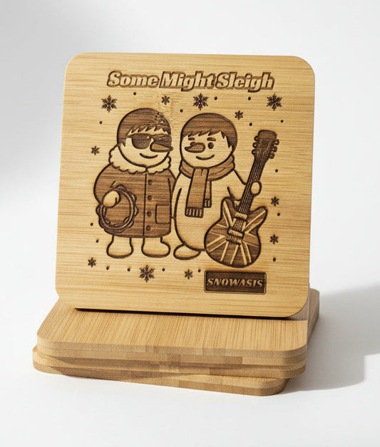 Funny Oasis-inspired bamboo coaster with two snowmen, engraved text “Some Might Sleigh” and “Snowasis” – Christmas music fan gift