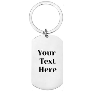 Reverse of personalised lawn bowls stainless steel dog tag keyring showing laser engraved personal message area on 
white background