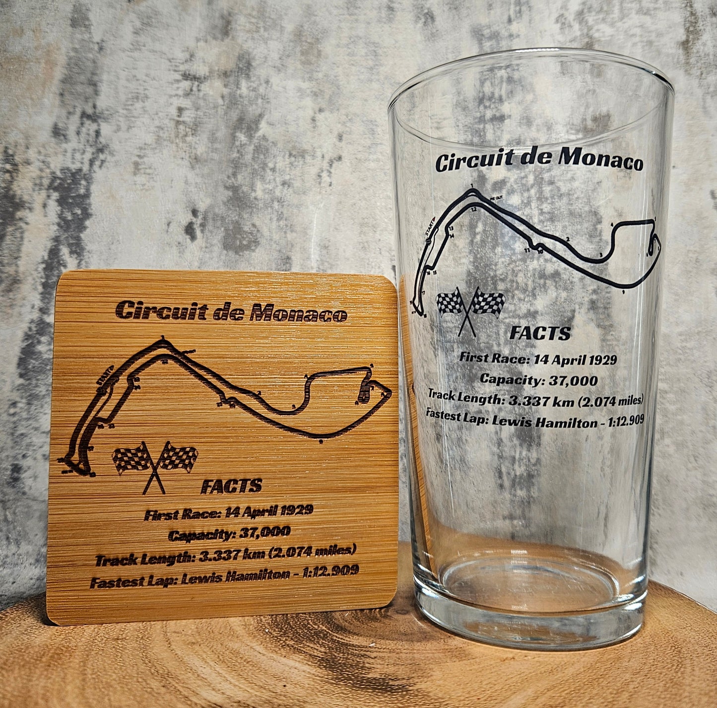 Custom motorsport pint glass showing track map and fastest lap details