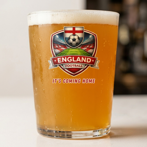 Glass of beer with an England football-themed label on a white background