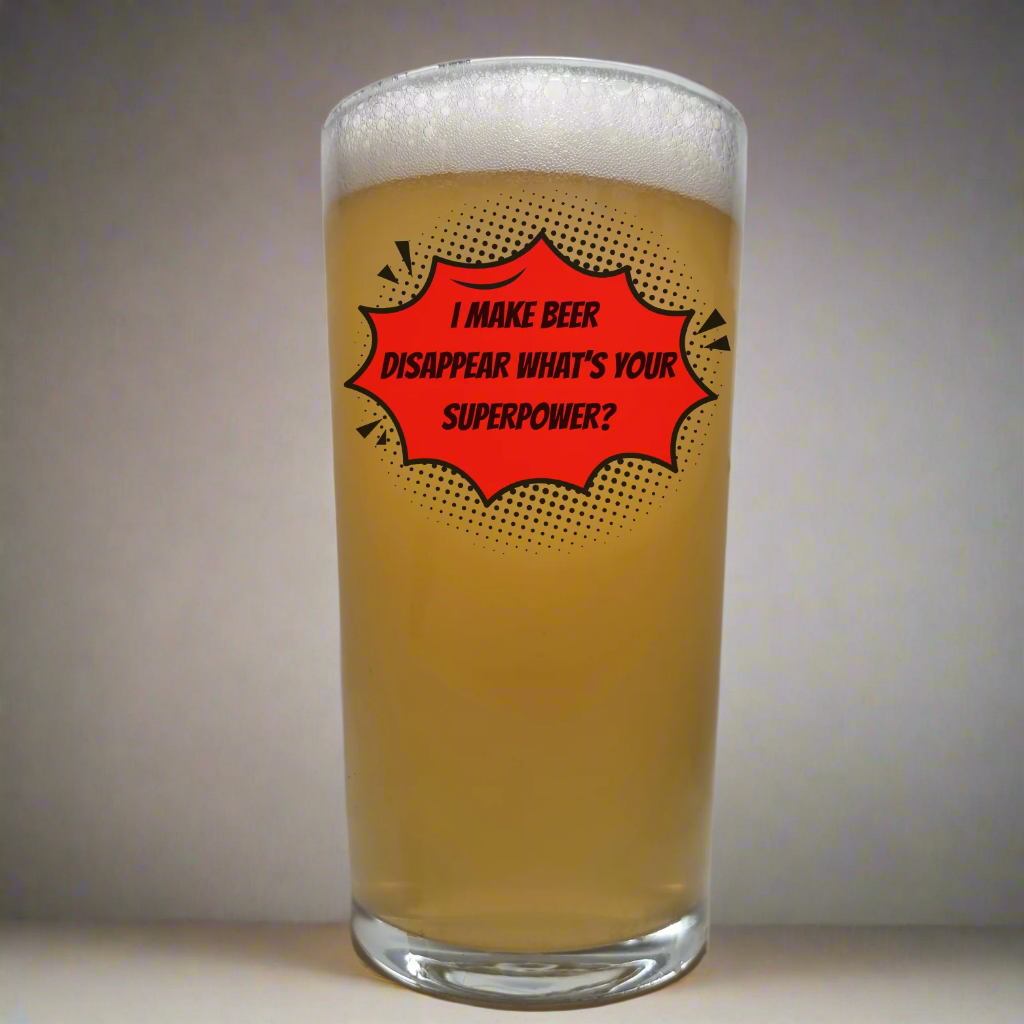 Engraved pint beer glass with the quote “I make beer disappear, what’s your superpower?” – funny superhero-themed gift for beer lovers

