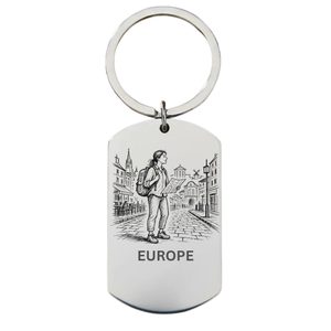 Europe backpacker keyring laser engraved stainless steel dog tag 
with female backpacker on cobblestone European town square with map and city buildings on white background