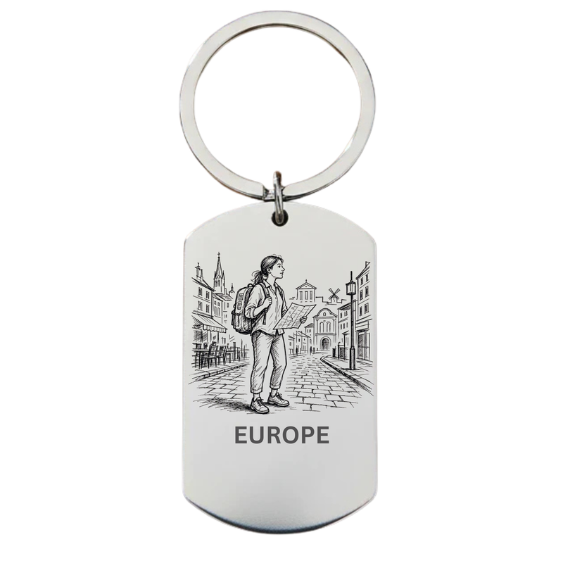 Europe backpacker keyring laser engraved stainless steel dog tag 
with female backpacker on cobblestone European town square with map and city buildings on white background
