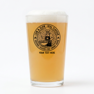 Personalised BBQ skull grill master engraved pint glass filled with golden beer, featuring Low and Slow Real Flavour design with custom text below