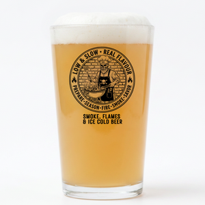 Personalised grill master pint glass gift for dad shown as Father's Day present with BBQ skull engraving and custom name text