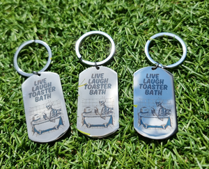 Live Laugh Toaster Bath Stainless Steel Keyring – Laser Engraved Dark Humour Keychain with Skeleton in Bathtub – Funny Goth Gift, Emo Aesthetic Accessory First Glass Designs