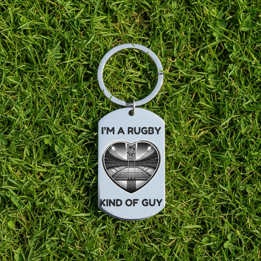 I'm a Rugby Kind of Guy personalised stainless steel dog tag keyring featuring England rugby stadium heart design with St George cross and rose detail on white background, funny personalised gift for rugby dads and England rugby fans with custom engraving available on reverse