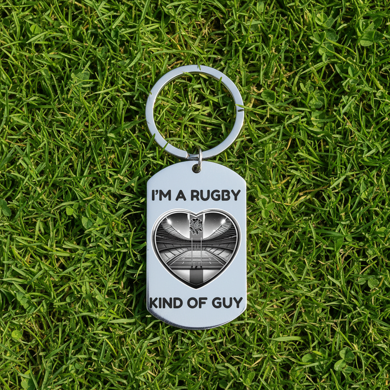 I'm a Rugby Kind of Guy personalised stainless steel dog tag keyring featuring England rugby stadium heart design with St George cross and rose detail on white background, funny personalised gift for rugby dads and England rugby fans with custom engraving available on reverse