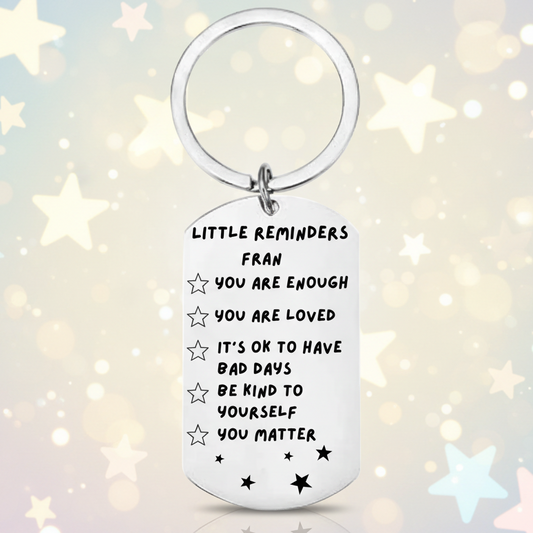 Personalised affirmation keyring with custom name Fran, featuring five positive reminders: you are enough, you are loved, it's ok to have bad days, be kind to yourself, and you matter, with decorative stars