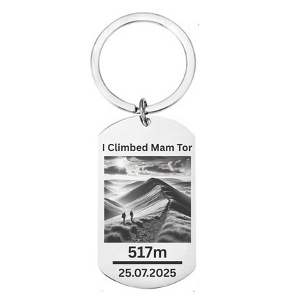 Engraved metal keyring with the text “I Climbed Mam Tor” – Peak District hiking souvenir and gift for walkers and adventurers.