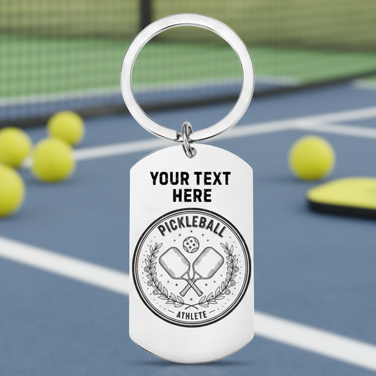 Personalised pickleball keychain engraved with custom name, featuring a pickleball paddle and ball design, ideal gift for pickleball players, fans, or sports enthusiasts.