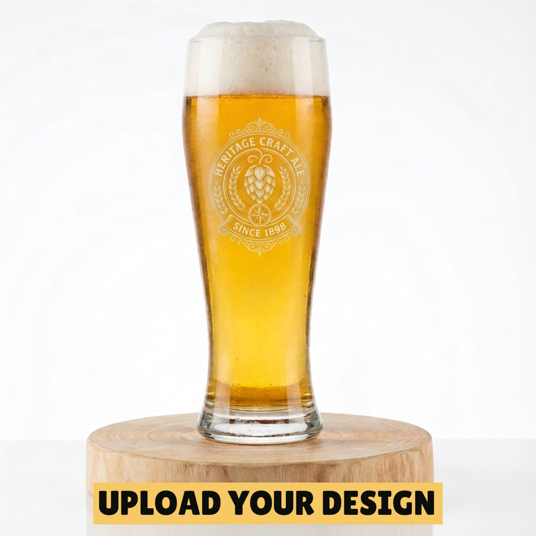 Personalised 500ml wheat beer glass with custom uploaded Heritage Craft Ale crest design filled with golden beer and frothy head