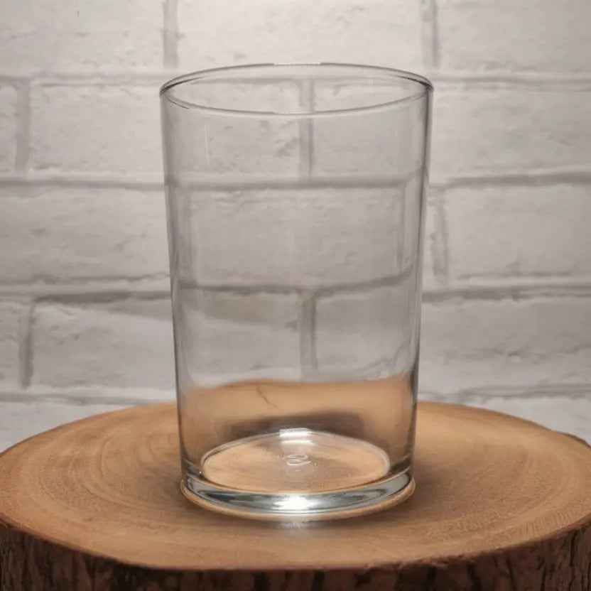 Personalised 51cl Tubo tumbler glass with custom printed design — large rocks glass shape with thick base, shown in use