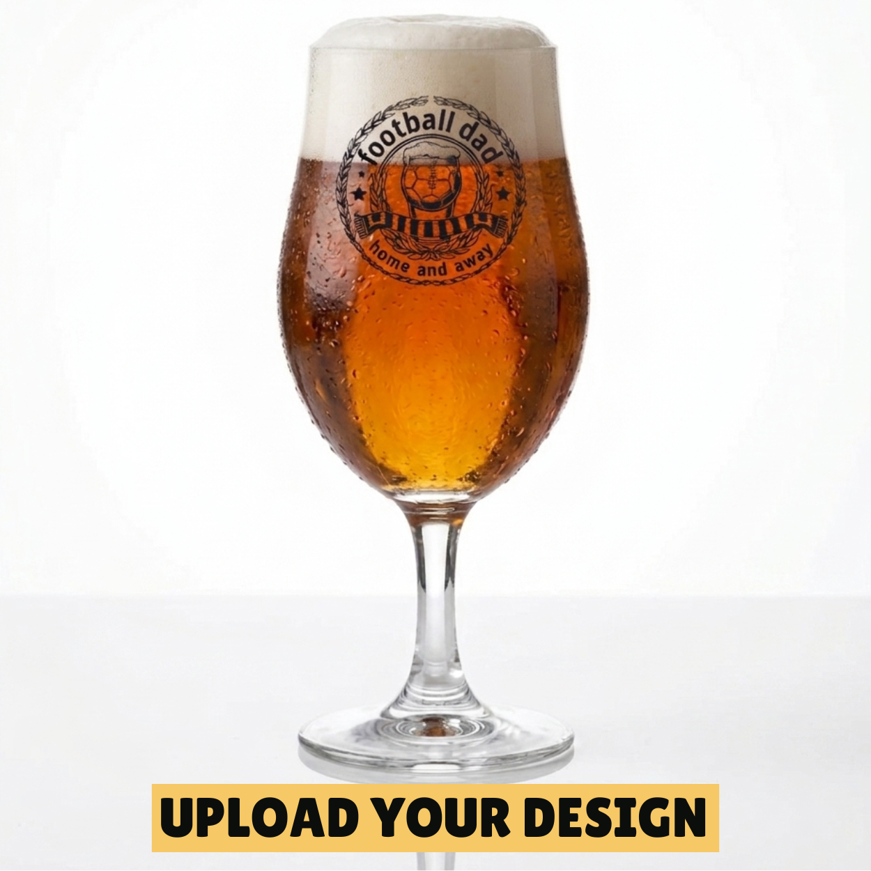 Personalised 568ml chalice pint glass with custom uploaded football dad home and away badge design filled with golden beer on marble surface
