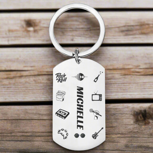 Personalised stainless steel keyring inspired by Oasis Britpop rock ’n’ roll era, engraved with custom name on front and optional message on back.