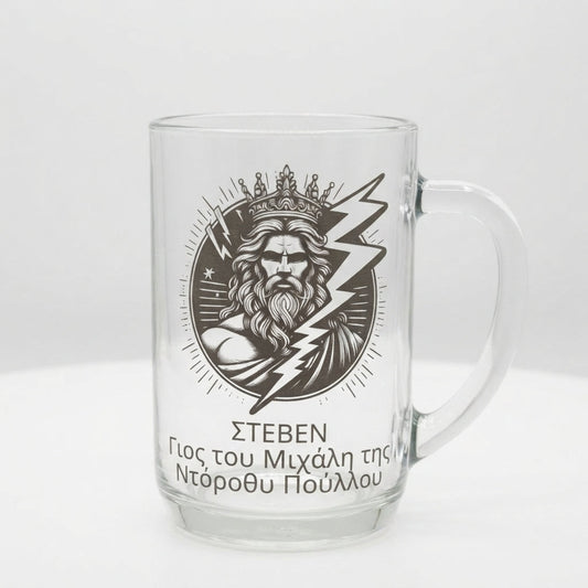 Personalised Zeus medallion beer glass custom printed with bold circular badge design showing crowned Zeus with lightning bolt and Greek character text personalisation on white background