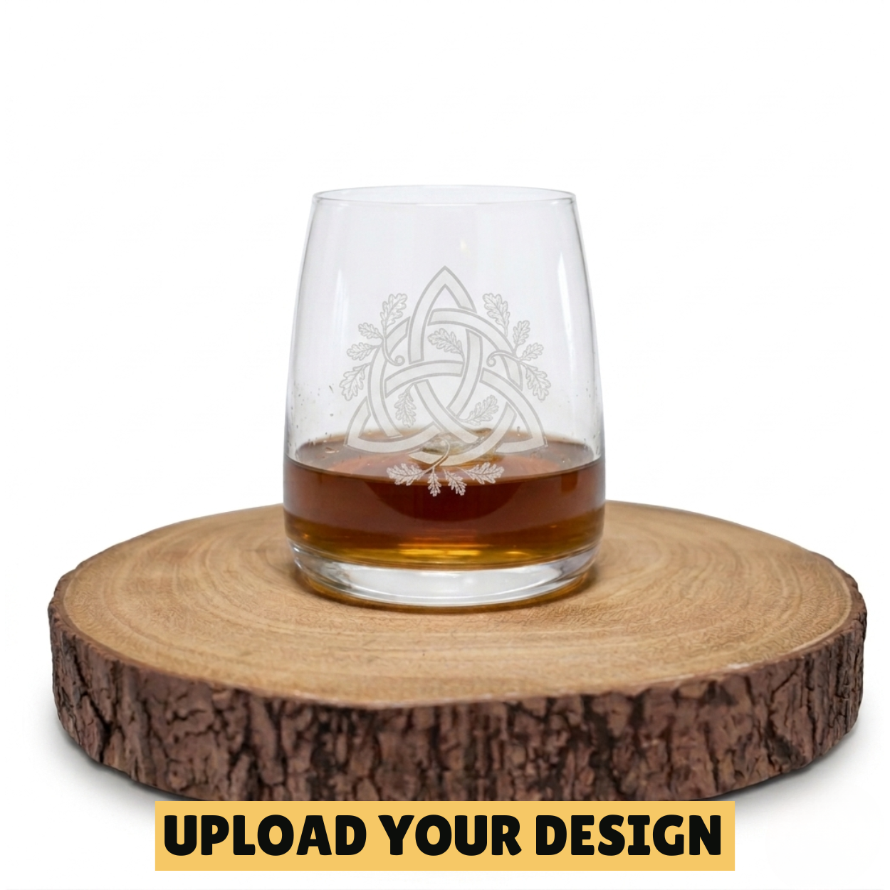 Personalised stemless whiskey glass with custom uploaded Celtic trinity knot oak leaf design on wooden board, unique gift for him