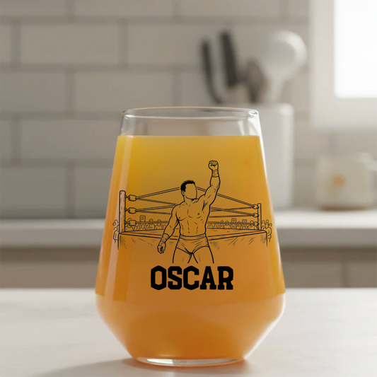 Personalised wrestling stemless beer glass custom printed with 
champion celebration scene showing wrestler raising fist in packed 
ring with personalised name below