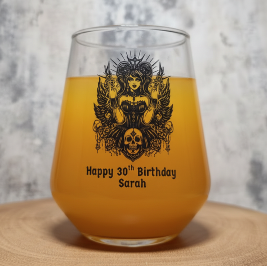 Personalised 30th birthday wine glass with hand-etched custom name and age, featuring gothic mystical goddess design with sun rays, protective wings, skull and rose decorations