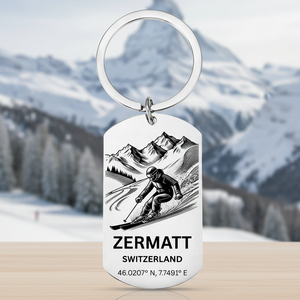 Keychain with a skier design and 'Zermatt Switzerland' text on a white background
