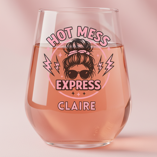 Personalised Hot Mess Express ink printed wine glass featuring a messy bun mum illustration with custom name, funny gift for mums