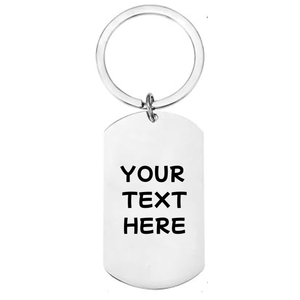 Reverse of personalised skate ramp stainless steel dog tag keyring showing laser engraved personal message area on 
white background