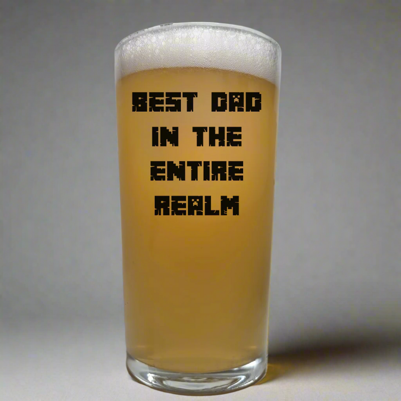 Ink printed pint beer glass with the text “Best Dad in the Entire Realm” – funny dishwasher-safe gift for gaming dads and fantasy fans