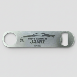 Personalised stainless steel bar blade bottle opener laser engraved with name, birth year and sports car silhouette design