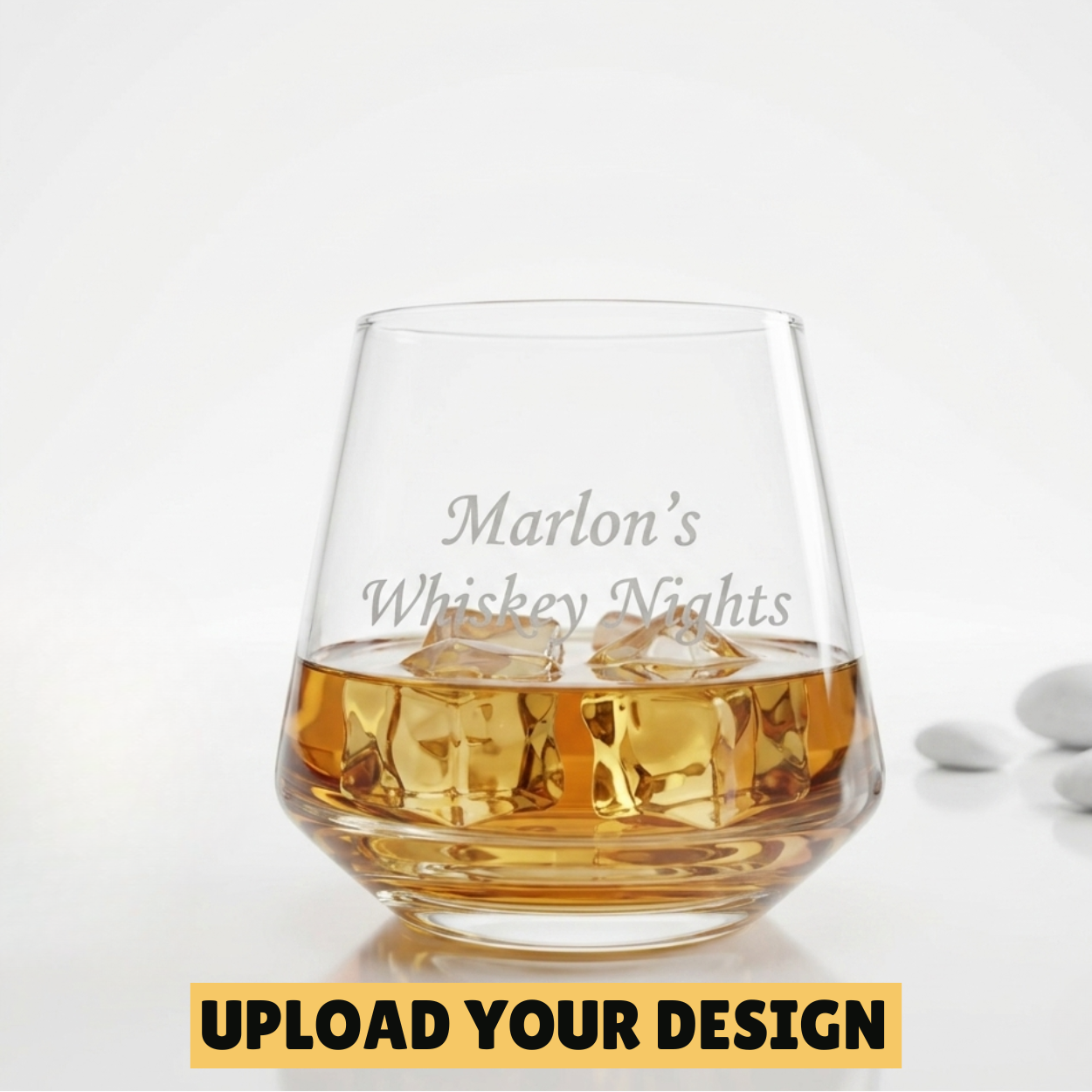 Personalised 300ml whiskey glass with wide base tapering to narrow rim, custom uploaded Marlon's Whiskey Nights design filled with whiskey and ice
