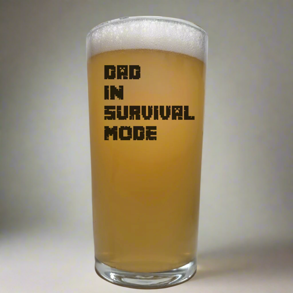 Ink-printed pint beer glass with the text “Dad in Survival Mode” – funny dishwasher-safe gift for gamer dads

