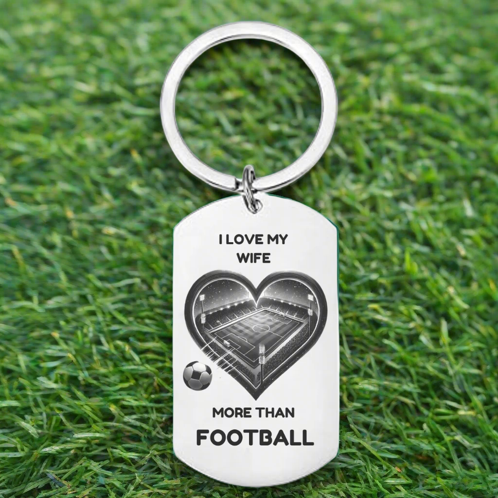Personalised stainless steel keyring with heart-shaped football pitch and “I Love My Wife More Than Football” engraving – romantic gift for husband from wife