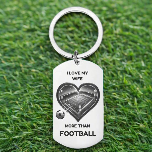 Personalised stainless steel keyring with heart-shaped football pitch and “I Love My Wife More Than Football” engraving – romantic gift for husband from wife