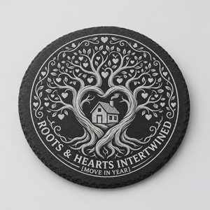 Personalised new home slate coaster laser engraved with a heart-shaped tree of life and house design, showing move-in year