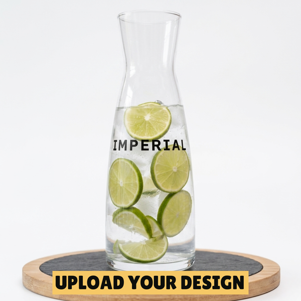 personalised glass carafe with custom printed Imperial design filled with water and limes on wooden board, unique gift
