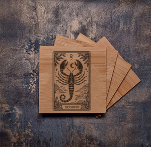 Personalised bamboo coaster engraved with the Scorpio zodiac sign, featuring its scorpion symbol and constellation, natural wood texture, ideal for horoscope enthusiasts or astrology décor.