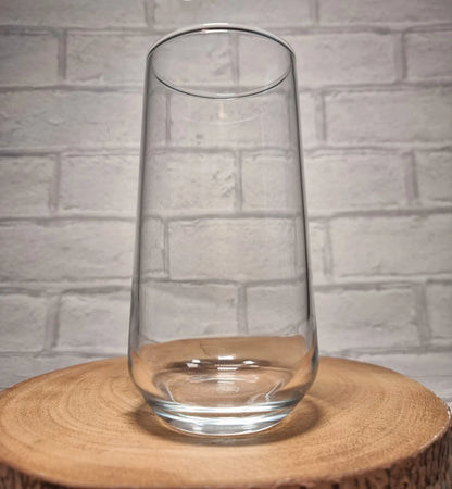 Close up of custom printed circular design on personalised stemless glass showing name and hobby artwork